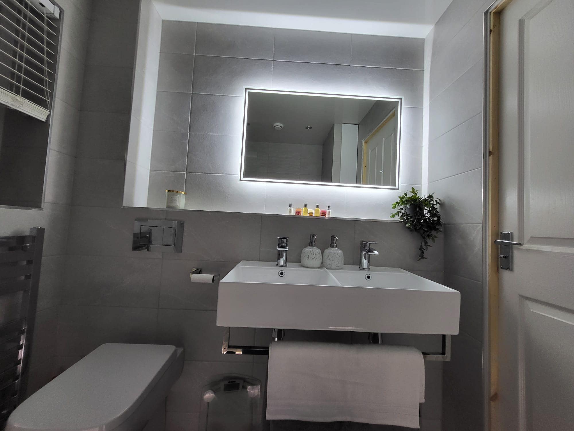 Modern bathroom with his and hers sink