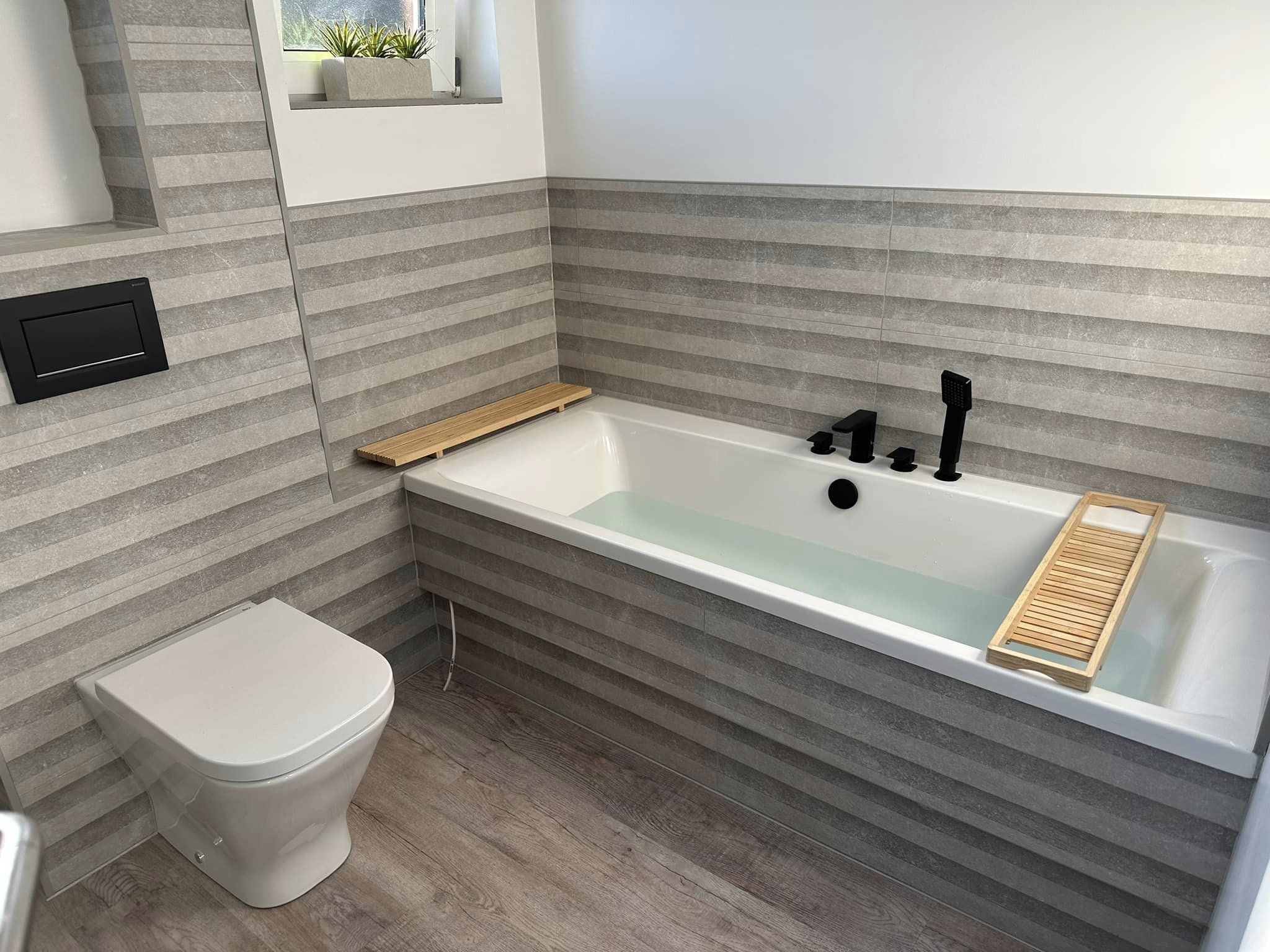 Textured striped panelling in a bathroom