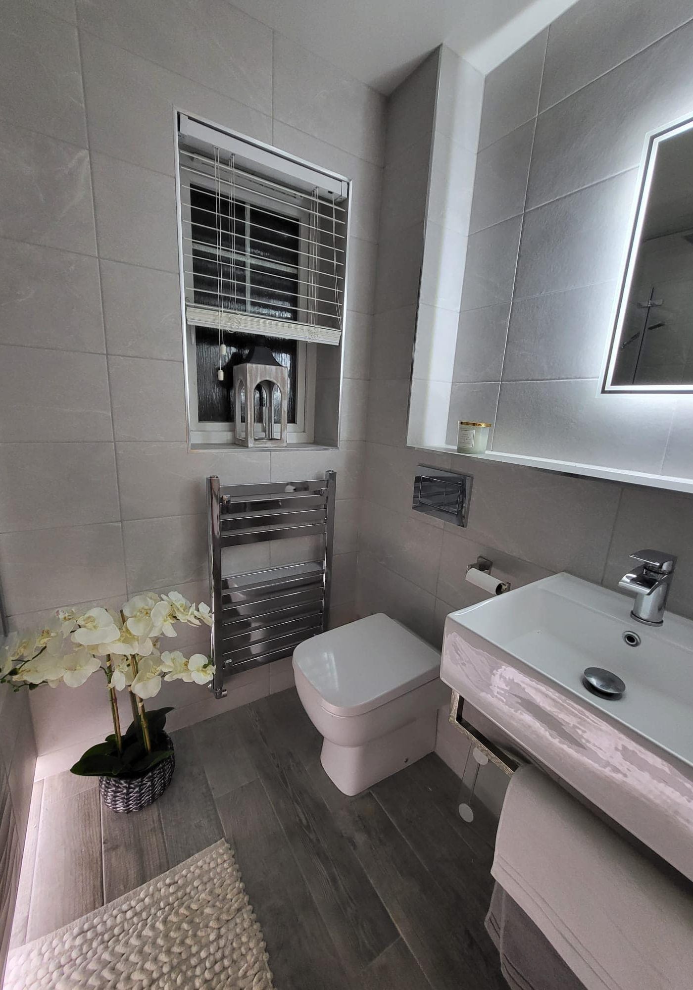 Modern grey tiled bathroom